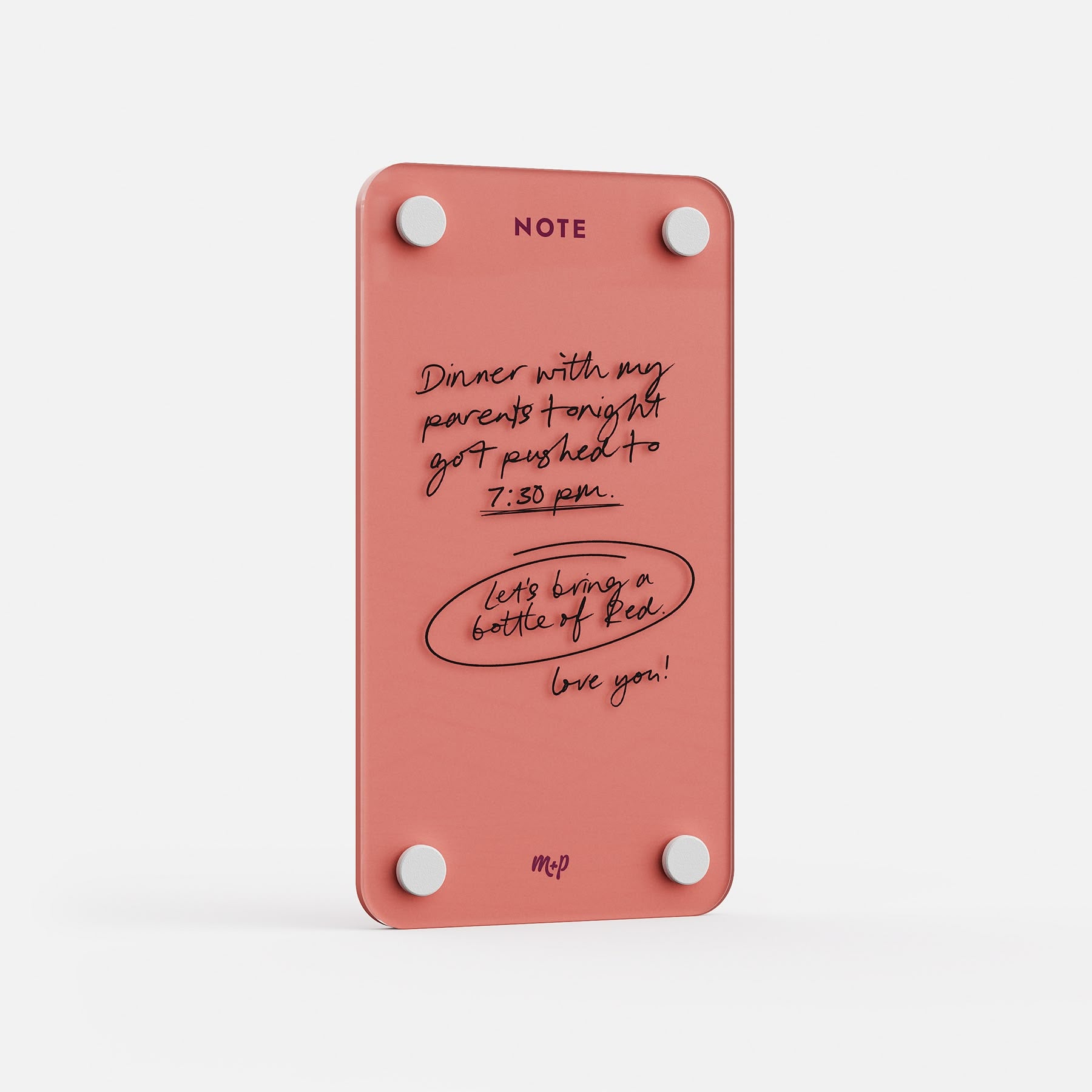 Angled view of a Coral tall magnetic acrylic note board with a handwritten note to a partner
